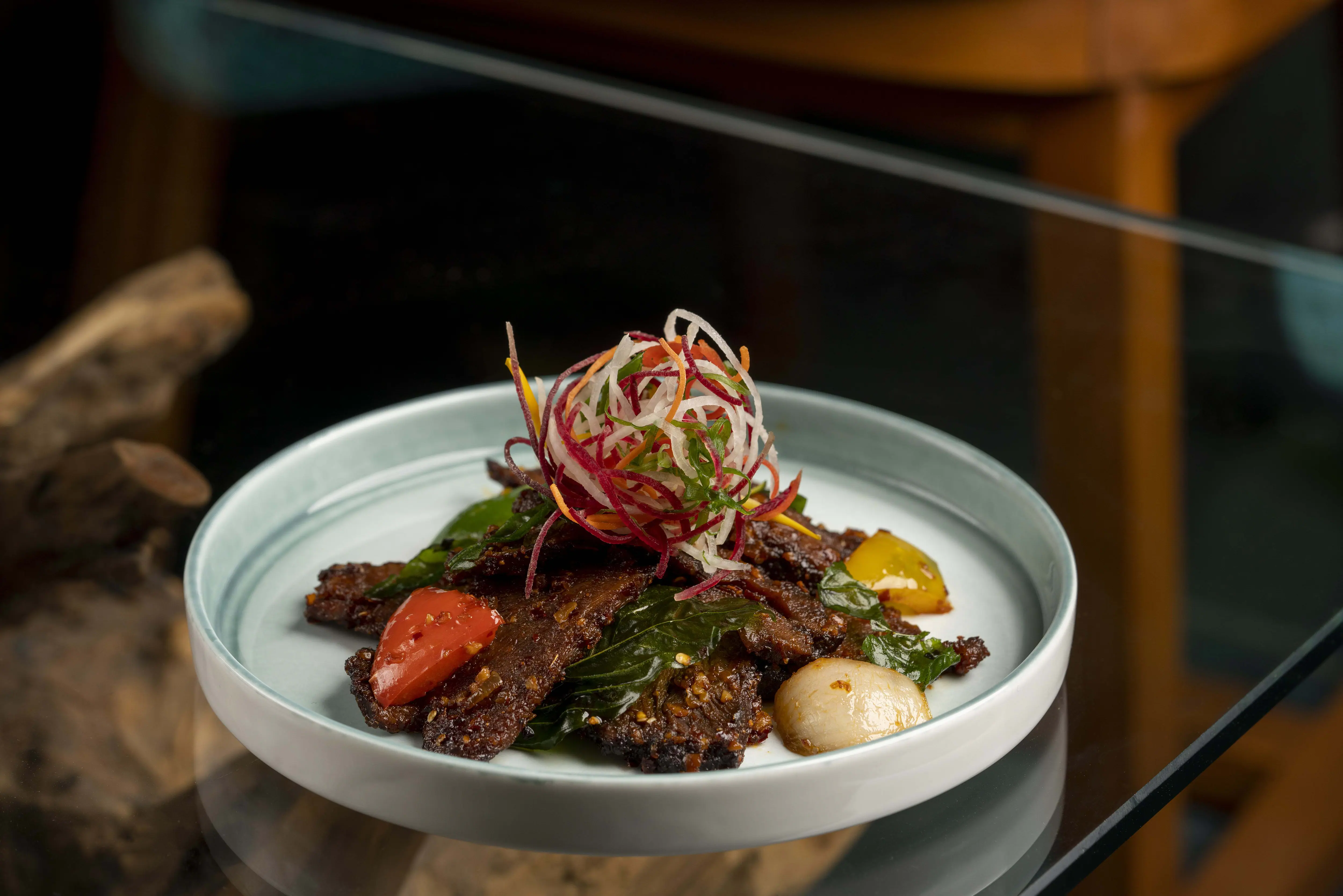 Photograph from Makau's own menu photography: a plated dish or drink from the kitchen and bar.